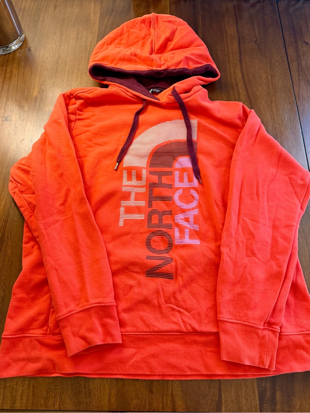 The North Face Orange Pullover Hoodie with Contrast Drawstrings